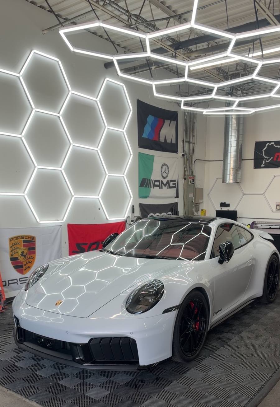 Porsche 911 T-Hybrid in the Euro Tints bay